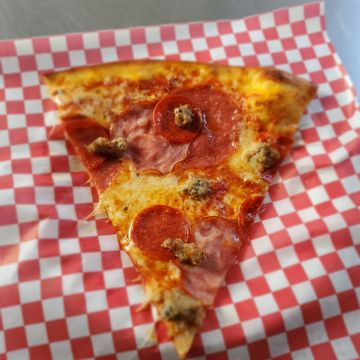 Meat Lovers Pizza slice 