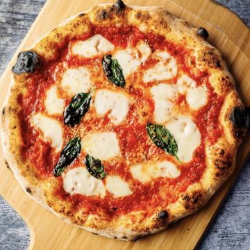 Large slice Margherita pizza