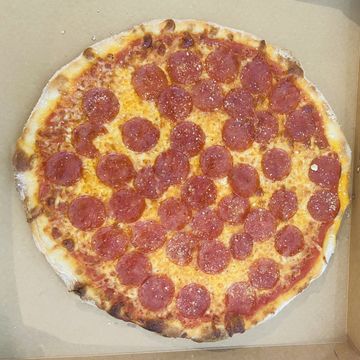 Large slice pepperoni pizza