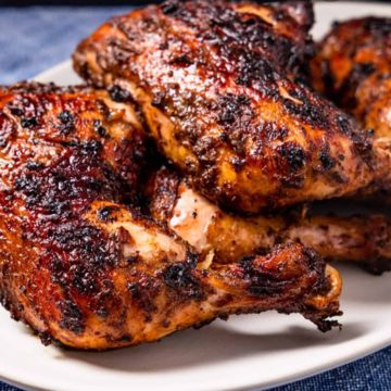Smoked Jerk Chicken W/ Mac & Baked beans 