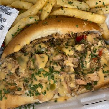 Jerk Salmon Philly W/ fries