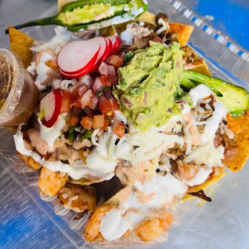 Surf n turf nachos or fries 