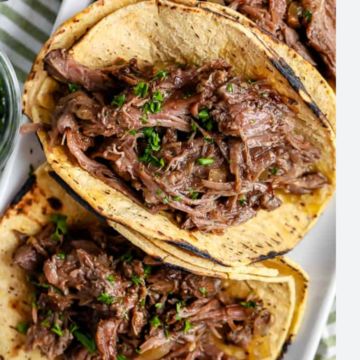 4 Barbacoa Tacos /  Shredded Beef