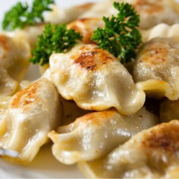 Pierogi with meat and kraut