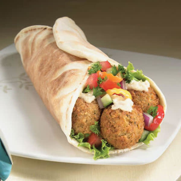Falafel Sandwich is Vegan. Pita bread with Falafel, onions, tomatoes, lettuce. All Gyros come with Dolmas