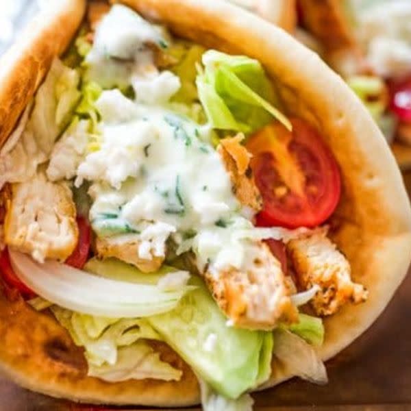 Chicken Sandwich Comes on pita bread with tzatziki sauce, onions, tomatoes, lettuce. All Gyros come with Dolmas