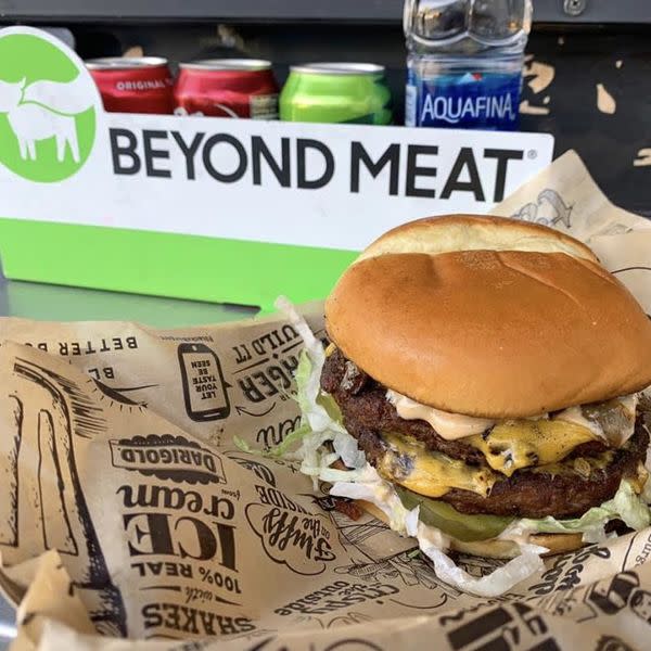 Beyond Stack comes with Beyond Beef, American Cheese, Stack Sauce, Caramelized Onions, Shredded Lettuce, Pickles. Vegan/ Vegetarian friendly. Includes a side of fries