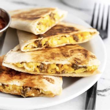 Breakfast Quesadilla (Egg and choice of cheese) w/ a Hashbrown