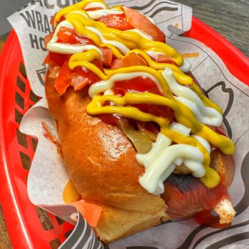 Gourmet bacon wrapped hotdogs