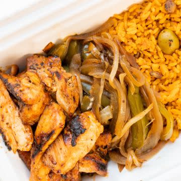 Caribbean Rice Bowl - Choice of Grilled BBQ Chicken, BBQ Pulled Pork, Fried Chicken, Vegetarian or Vegan, Served with Caramelized Onions and Peppers