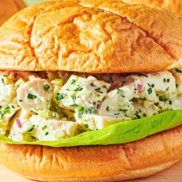 Chicken salad on a toasted roll.