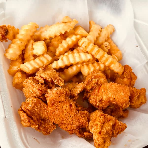 Hand breaded Chicken nuggets W/ choice of side