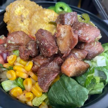 Fries, wings, tostones, salads, dinner rolls