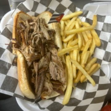 Sándwich cubano de puerco asado