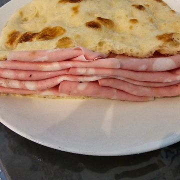 White pizza with mortadella