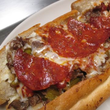 Pizza Cheesesteak (served with fries/drink)