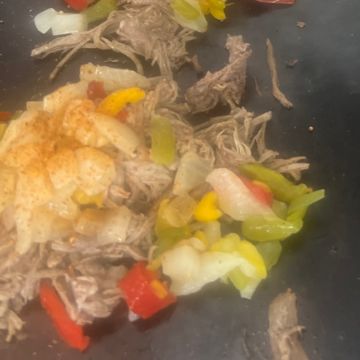 Vaca frita (shredded flat steak)