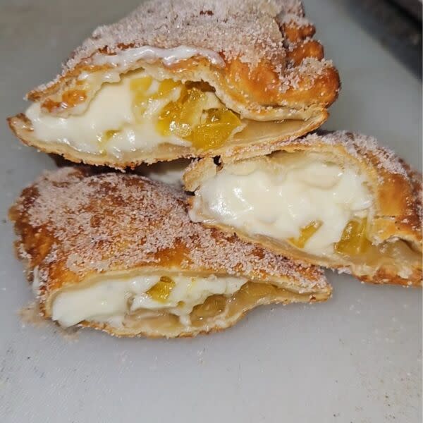 Mango cheese cake empanada with cinnamon sugar