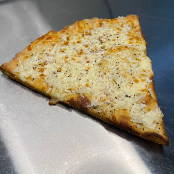 “The Lupa” pizza slice