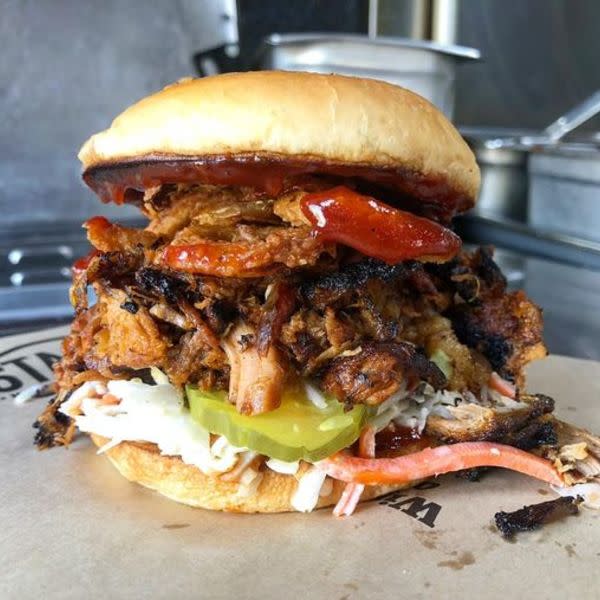 The Pork Sammy comes with Slow cooked Pulled Pork, Memphis Sweet BBQ sauce, Slaw, Pickles, Crispy Onions, Piled on a toasted Brioche Bun. Includes a side of fries
