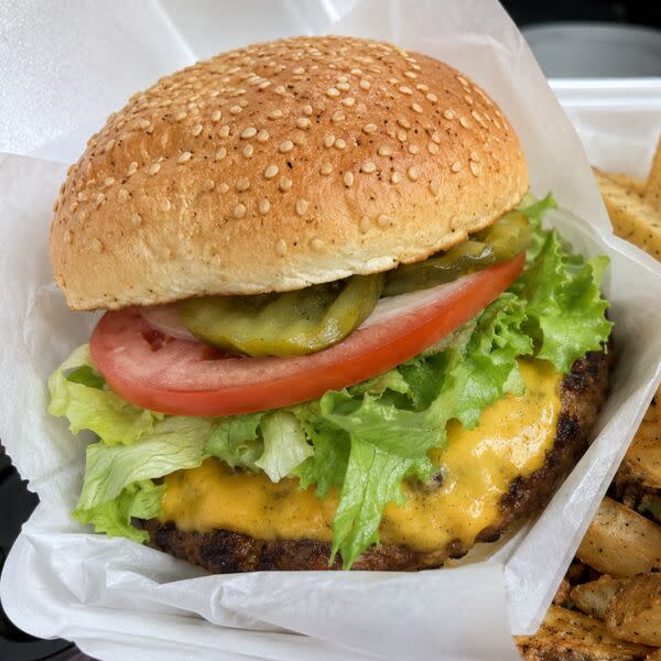 Hand Formed Fresh Ground Angus Burgers w/ Sesame Seeded Buns