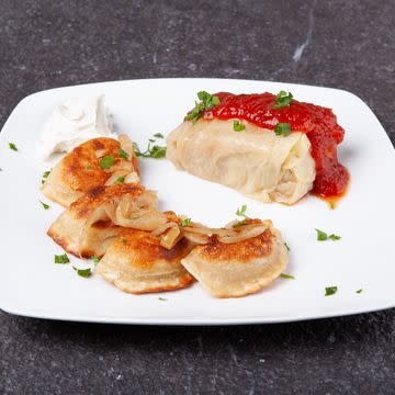 Golabki -  stuffed cabbage roll, served with 5 Pierogies